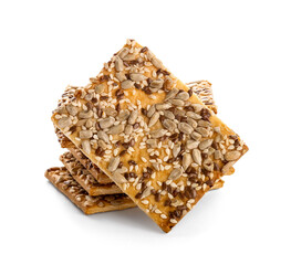 Tasty crackers with seeds on white background