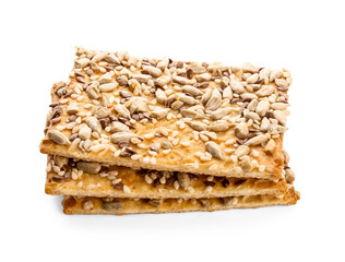 Tasty crackers with seeds on white background