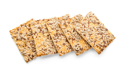 Tasty crackers with seeds on white background