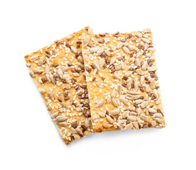 Tasty crackers with seeds on white background