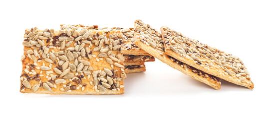 Tasty crackers with seeds on white background