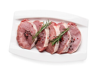 Plate with fresh raw meat and spices on white background