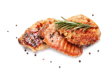 Tasty steaks with spices on white background