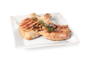 Plate with tasty steak and spices on white background