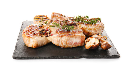 Board with tasty steaks and spices on white background
