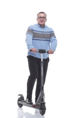 in full growth. modern mature man with electric scooter