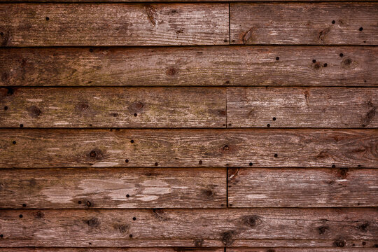 Background image of brown wood grain with scratches