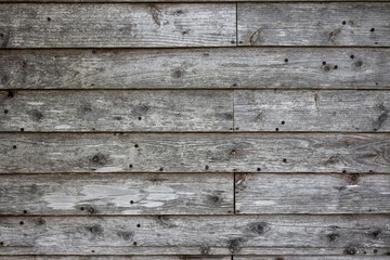 Background image of grey wood grain with scratches