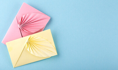 colorful envelopes isolated on blue background,copy space