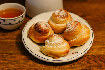 Traditional Easter baking served with honey at breakfast. Delicious homemade hot buns from sweet yeast dough,CZ jidase, traditionally baked in Czech on Holy Maundy Thursday before Easter. Czech food