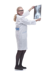 side view. smiling therapist with an x -ray .