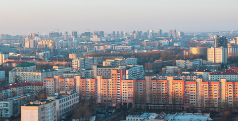 Minsk roofs of houses at sunset