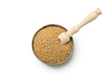Bowl with mustard seeds and scoop isolated on white background
