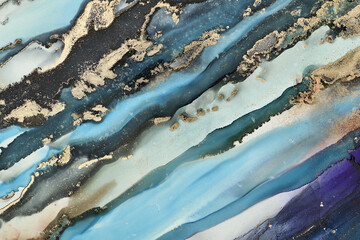 Alcohol ink art.Mixing liquid paints. Modern, abstract colorful background, wallpaper. Marble texture.Translucent colors