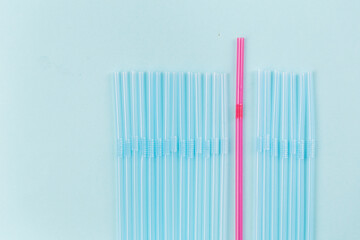 Concept about epidemic starts, many plastic straws and one different