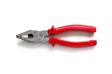 Fototapeta premium Old pliers with red plastic handles on a white background