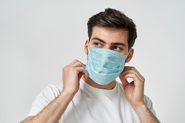 Young man wearing medical mask prevention COVID-19