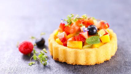 delicious fruit tart with strawberry,  blueberry and mango