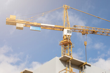 Construction crane. Construction site, high-rise buildings and development, partment house