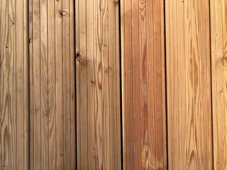 Natural brown wood planks background. Wooden boards texture. Stock photo.