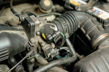 Idling regulator valve in the car, close-up.