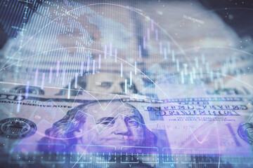 Double exposure of forex graph drawing over us dollars bill background. Concept of financial markets.