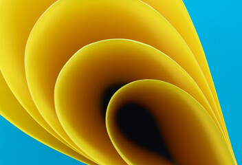 Abstract yellow and blue colored background with curved lines and shapes