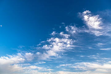 beautiful blue background with clouds and moon and clouds pattern.