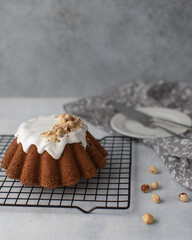 Delicious freshly baked Easter cake on grey background