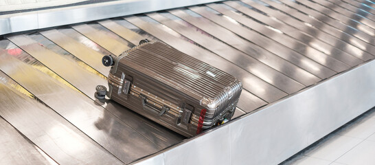luggage bag or Suitcase on conveyor belt in the international airport