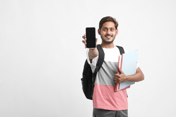 Young indian college student showing smartphone Screen.