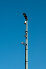 Obraz premium supervision cameras installed at the post of a streetlamp
