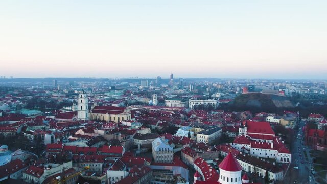 Panoramic view of Vilnius Old Town after sunset. Aerial drone footage.
