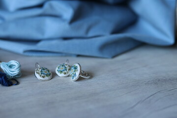 Earrings embroidered with flowers in vintage fashion