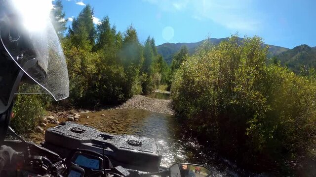 A quad bike is off-road. 4 x4 quad bike