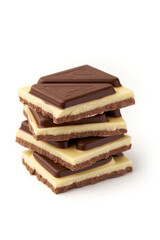 Stack of pieces of milk chocolate isolated on white background