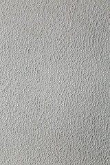 Obraz premium Modern pattern of light gray decorative plaster.Trendy abstract background. Texture for design and decoration with copy space.