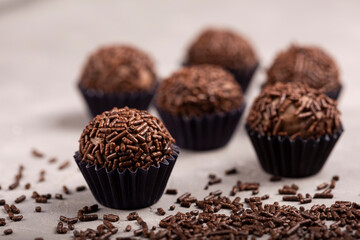 Chocolate brigadeiro with granulated chocolate, traditional Brazilian sweet.
