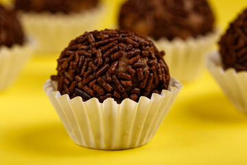 Chocolate brigadeiro with granulated chocolate, traditional Brazilian sweet.