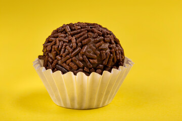 Chocolate brigadeiro with granulated chocolate, traditional Brazilian sweet.