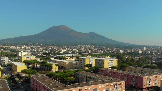 Aerial view of Sleeping area on the outskirts of the city. View of the Vesuvius volcano. Houses, streets and parked cars. Real estate in Boscoreale, Naples. Italy