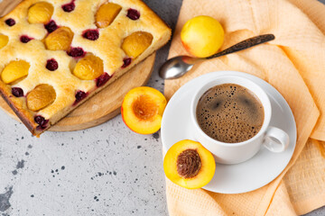 Obraz na płótnie Canvas Homemade apricot pie top view, espresso coffee cup