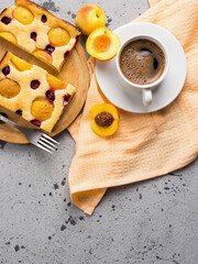 Homemade apricot pie top view, espresso coffee cup