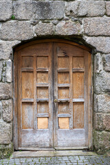 old wooden door in wall