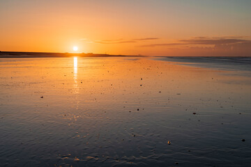 Sunrise over Camber Sands low tide in East Sussex, south east England