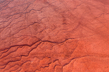 Neszmély, Hungary - Aerial view of drought red mud surface, industry waste, abstract nature texture.