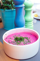 Healthy vegan cold soup prepared with beetroots and vegetables perfect as dietetic summer dish