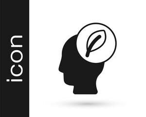 Black Human head with leaf inside icon isolated on white background. Vector