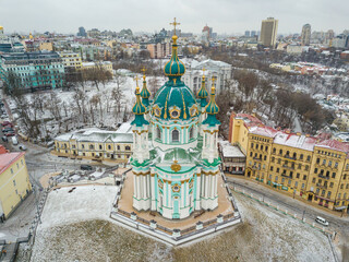 St. Andrew's Church in Kiev in snowy weather. Aerial drone view.