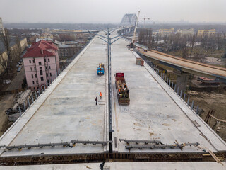 Naklejka premium Bridge under construction in Kiev. Aerial drone view.
